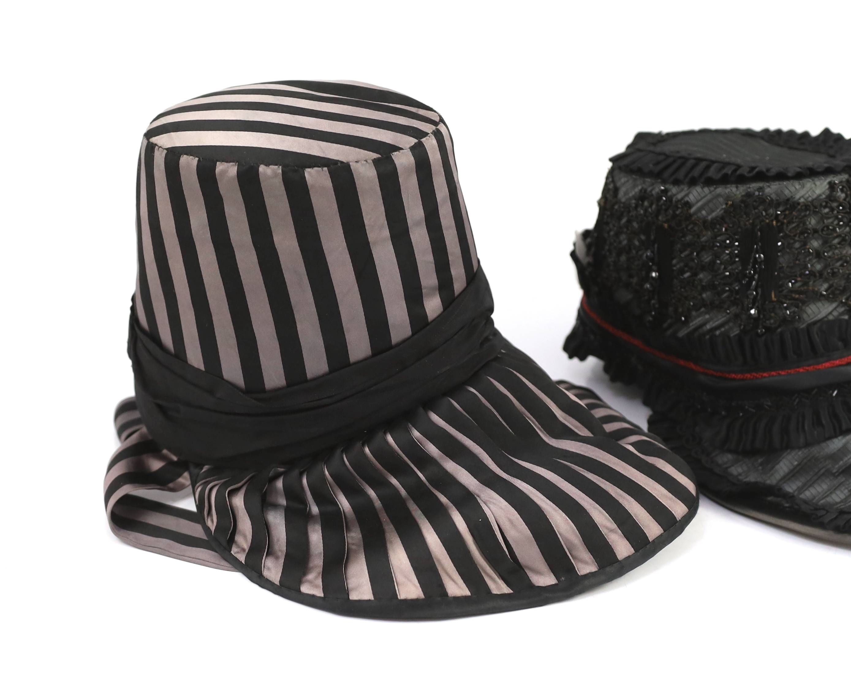 Two lady's Victorian style bonnets, silver and black striped and the other silver black with jet trim. Ex Royal Opera House 'The Damnation of Faust'